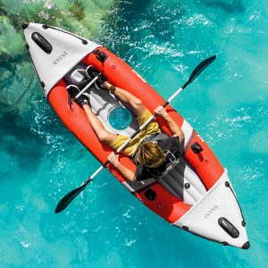 a bird's-eye view of an inflatable kayak with a window on the floor