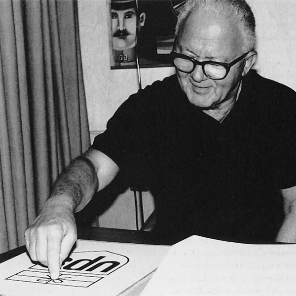 Paul Rand pointing at UPS logo