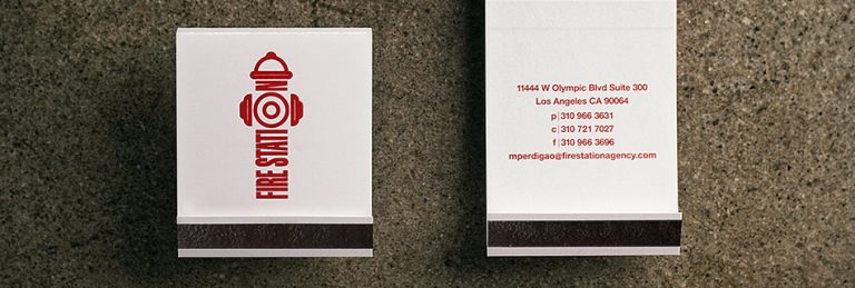 closeup of the business cards for Fire Station Agency