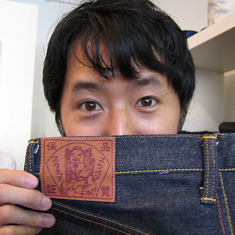 Phil holding the jeans